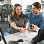 Customer receiving keys to a new car at our Hyundai dealership